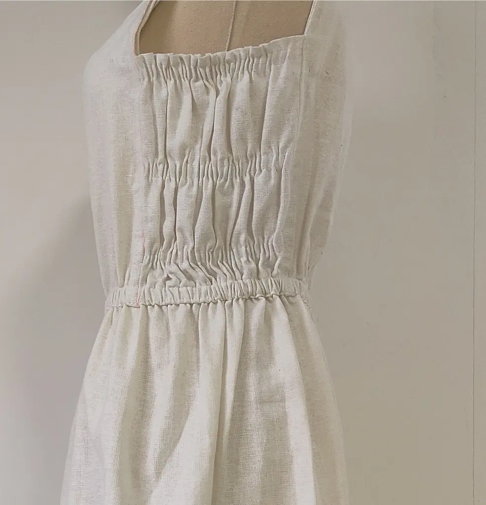 48 Linen White sleeveless medium skirt with flexible chest.webp